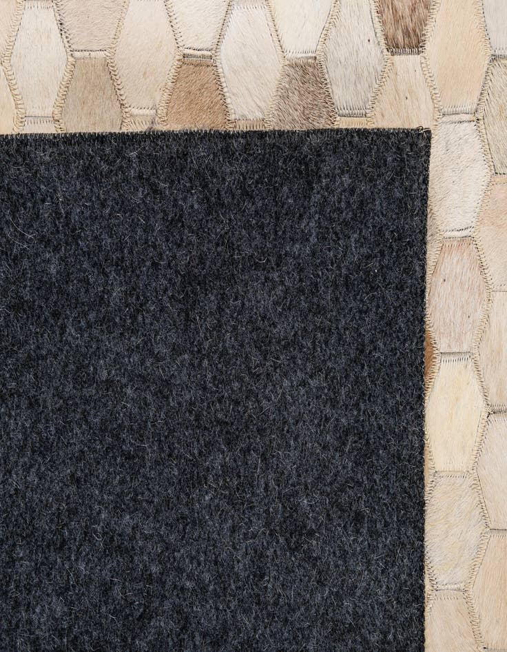Detail image of  5' x 7' 11 Cowhide - Patchwork Rug