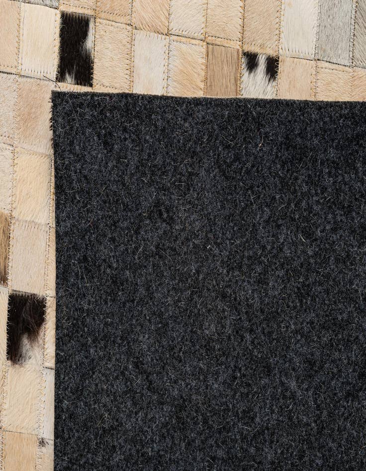 Detail image of  5' 2 x 7' 10 Cowhide - Patchwork Rug