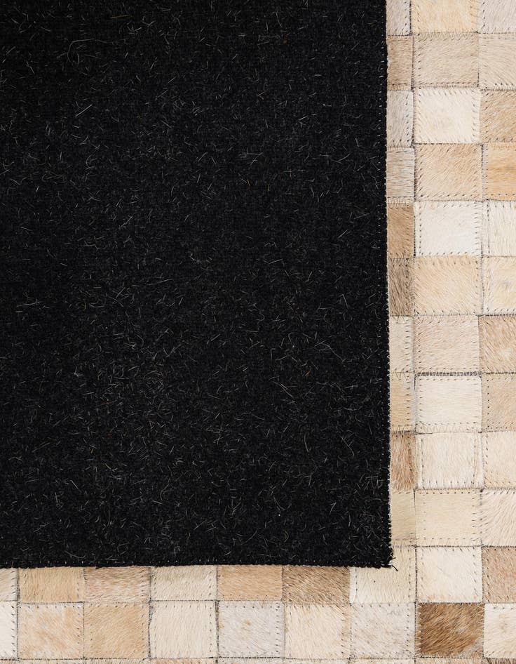 Detail image of  5' x 7' 11 Cowhide - Patchwork Rug