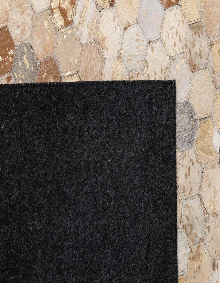 Detail image of  5' 1 x 7' 11 Cowhide - Patchwork Rug