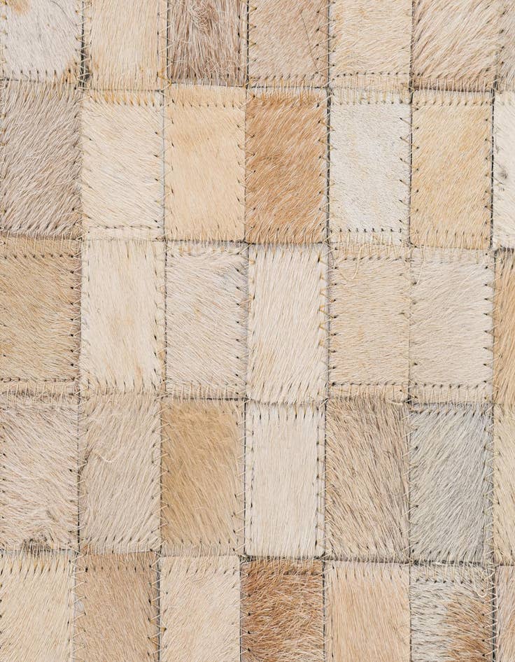 Detail image of  5' 1 x 7' 11 Cowhide - Patchwork Rug