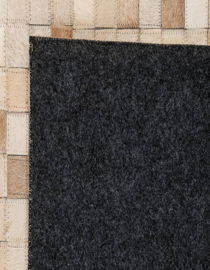 Detail image of  5' 1 x 7' 11 Cowhide - Patchwork Rug