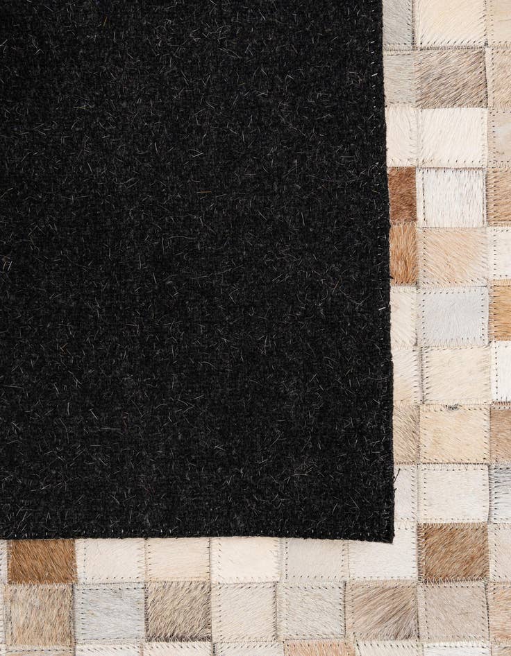 Detail image of  4' 11 x 8' 1 Cowhide - Patchwork Rug