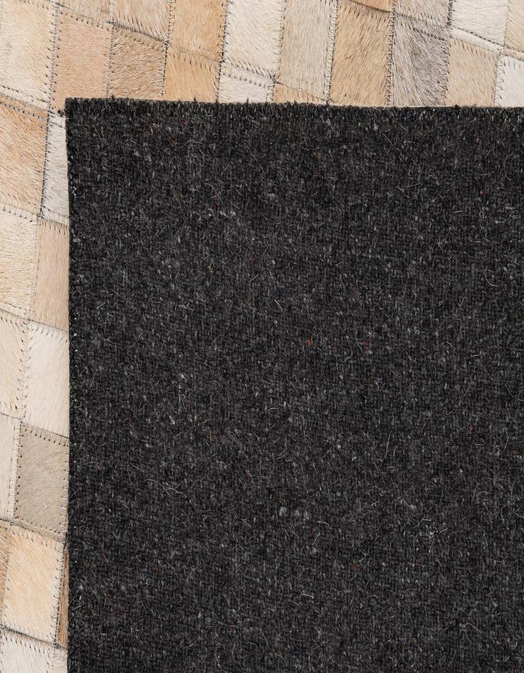 Detail image of  5' 1 x 8' 1 Cowhide - Patchwork Rug