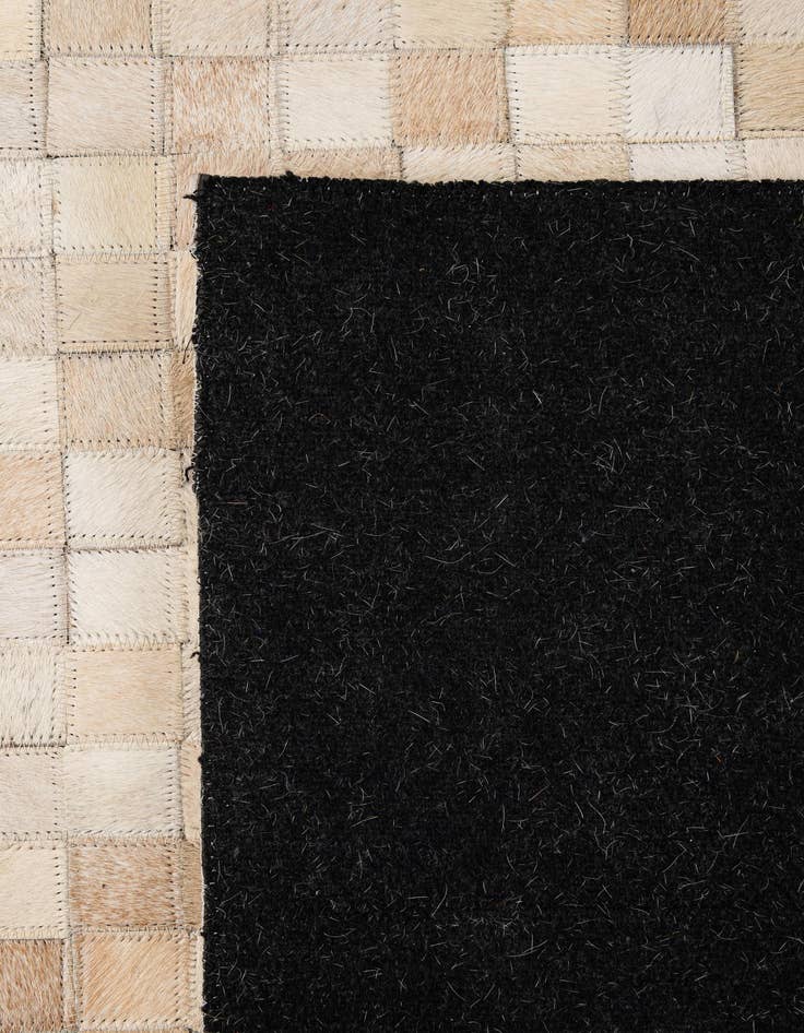 Detail image of  5' 1 x 7' 10 Cowhide - Patchwork Rug