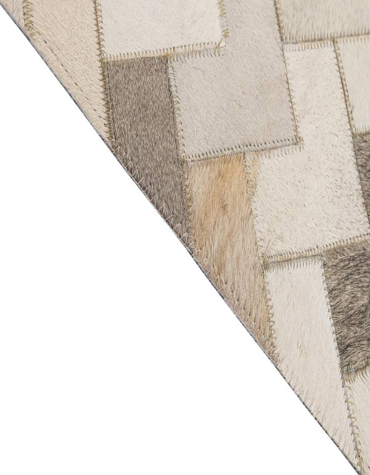 Detail image of  5' 2 x 7' 11 Cowhide - Patchwork Rug