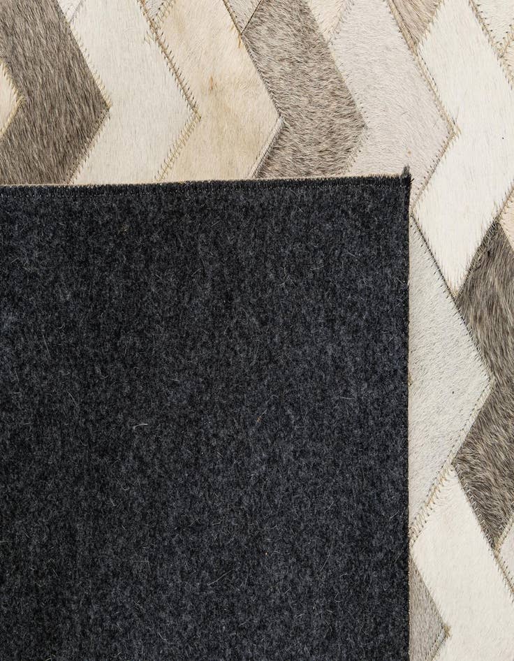Detail image of  5' 2 x 7' 11 Cowhide - Patchwork Rug