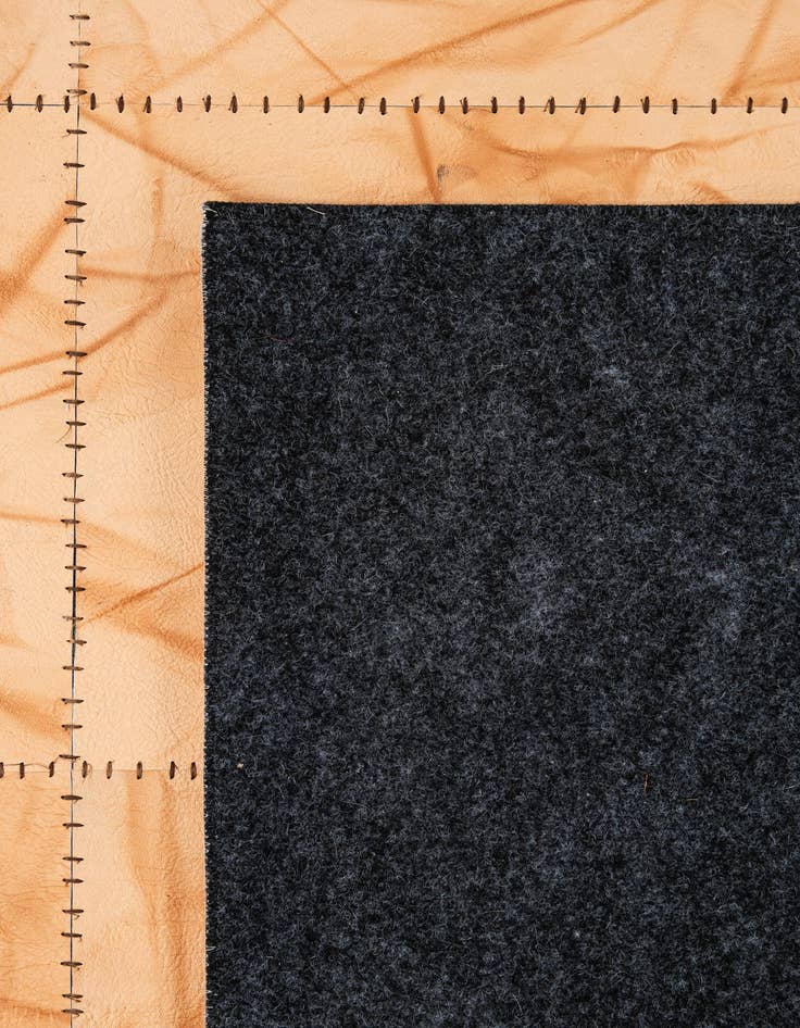 Detail image of  5' 1 x 7' 11 Cowhide - Patchwork Rug