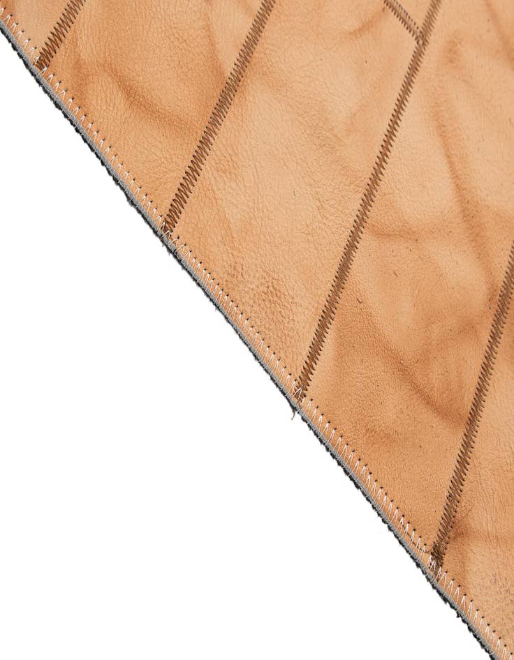 Detail image of  5' x 7' 11 Cowhide - Patchwork Rug