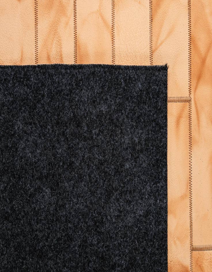 Detail image of  5' x 7' 11 Cowhide - Patchwork Rug