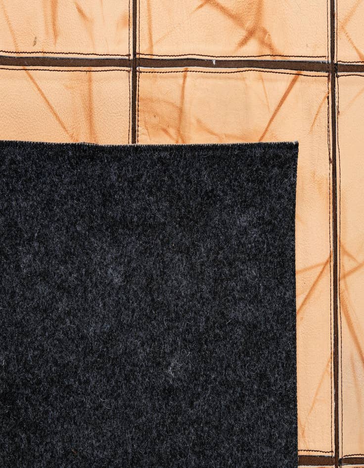 Detail image of  5' x 7' 11 Cowhide - Patchwork Rug