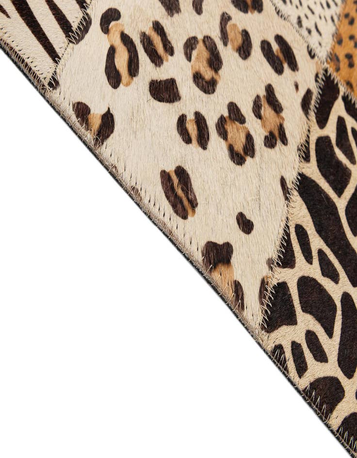 Detail image of  4' 1 x 5' 11 Cowhide - Patchwork Rug