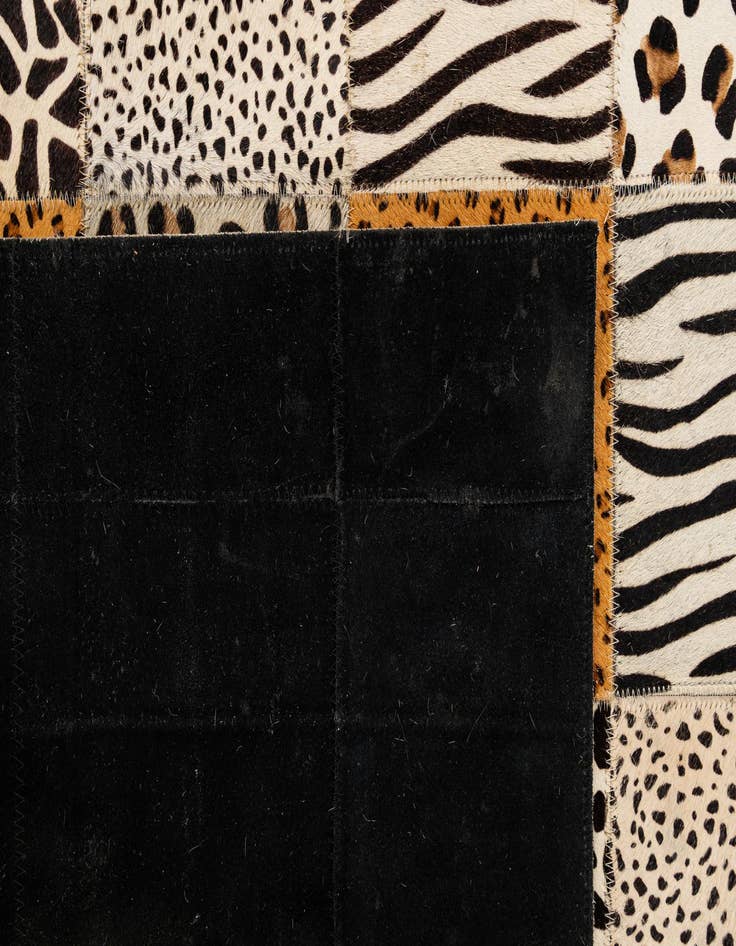 Detail image of  4' 1 x 5' 11 Cowhide - Patchwork Rug