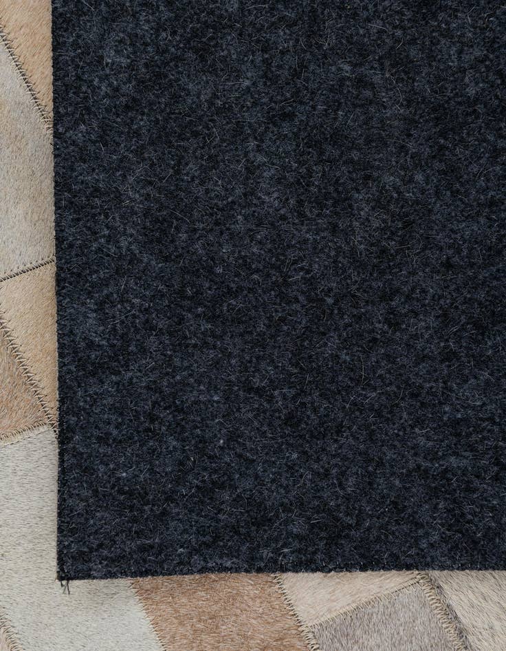 Detail image of  5' x 7' 9 Cowhide Leather Rug