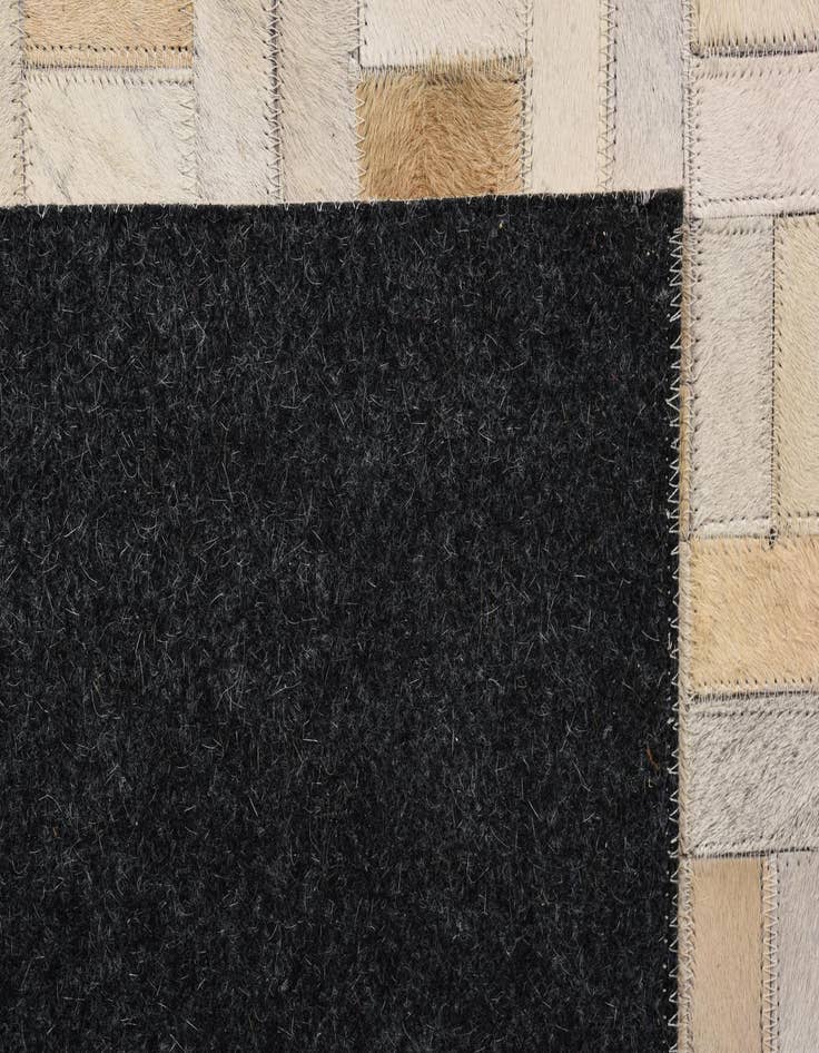 Detail image of  5' 4 x 7' 6 Cowhide Rug