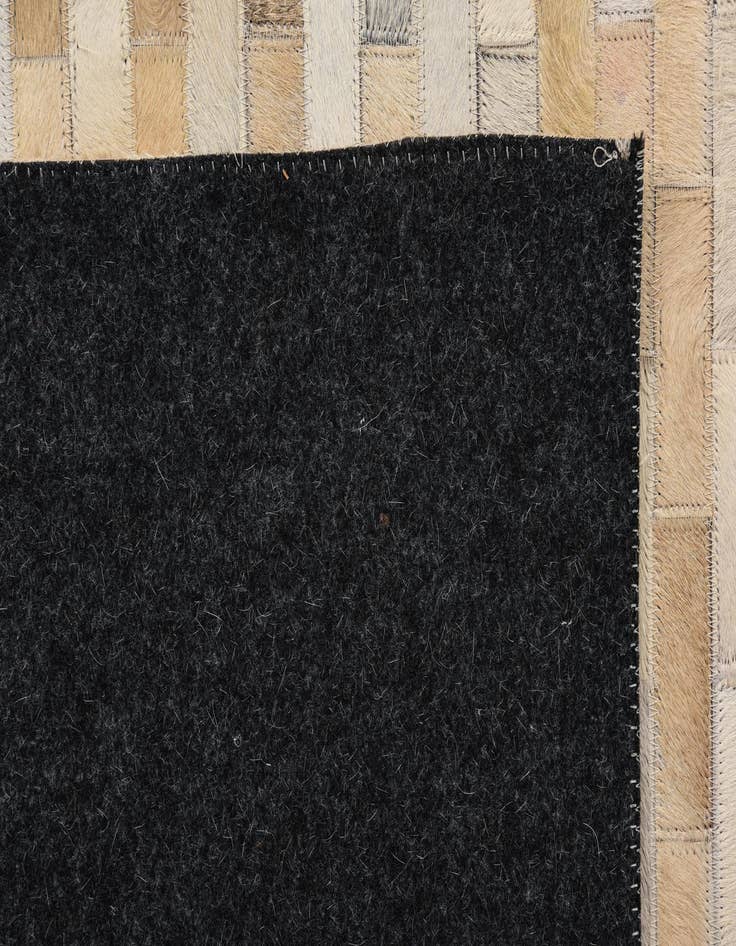 Detail image of  5' 4 x 7' 6 Cowhide Rug