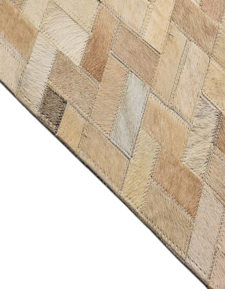 Detail image of  5' 4 x 7' 7 Cowhide Rug