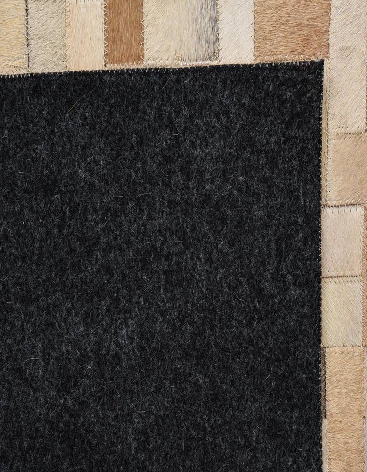 Detail image of  5' 4 x 7' 7 Cowhide Rug