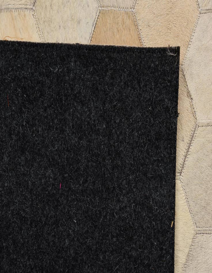 Detail image of  5' 4 x 7' 4 Cowhide Rug