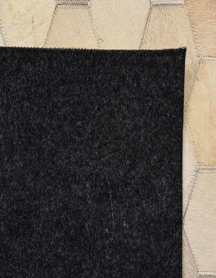 Detail image of  5' 4 x 7' 4 Cowhide Rug