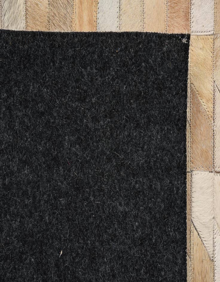 Detail image of  5' 4 x 7' 4 Cowhide Rug