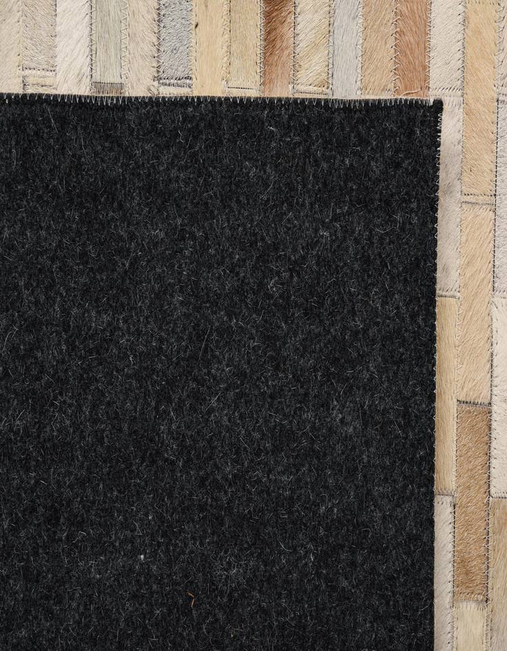 Detail image of  5' 4 x 7' 6 Cowhide Rug