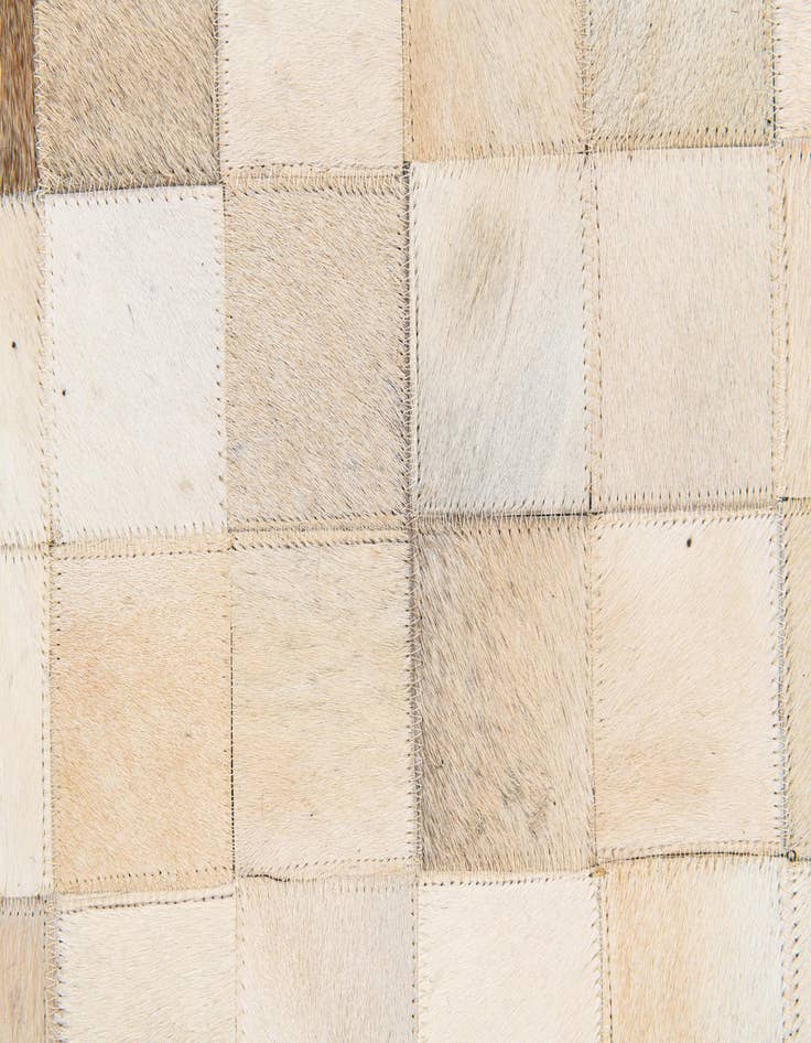 Detail image of  4' 11 x 7' 10 Cowhide Stocks Rug