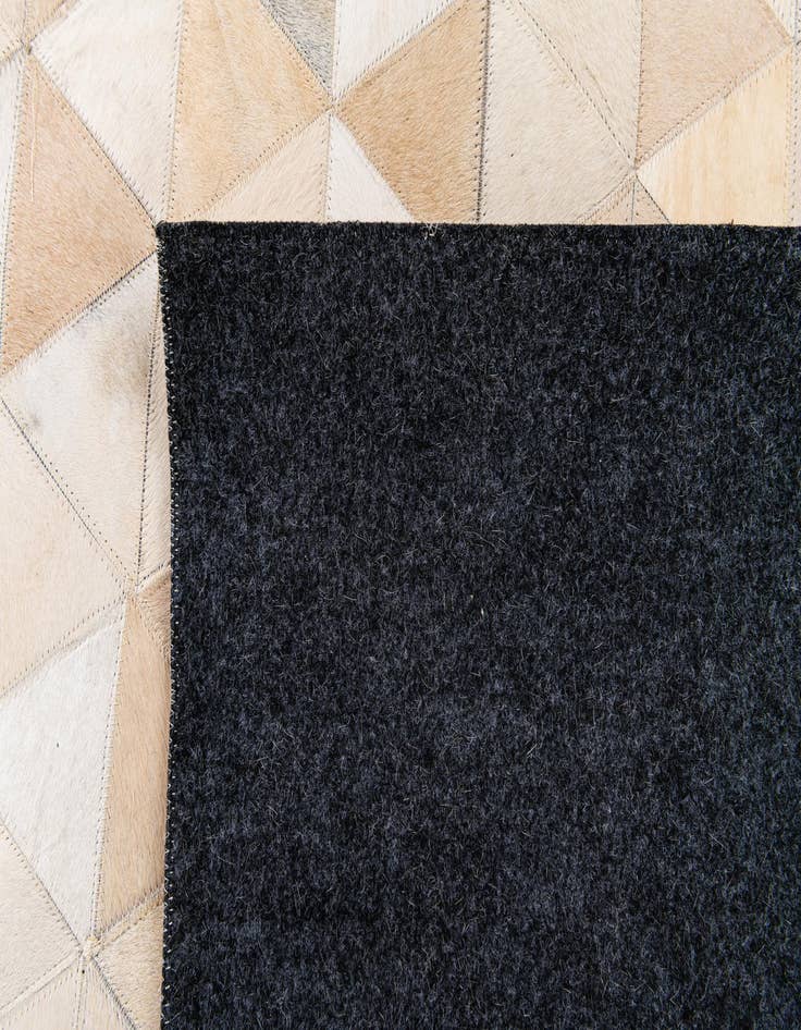 Detail image of  5' 1 x 8' 1 Cowhide Stocks Rug