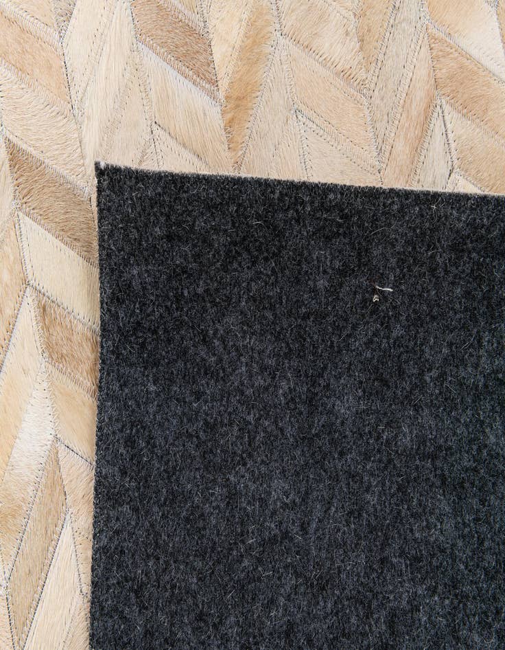 Detail image of  5' 1 x 7' 9 Cowhide Stocks Rug
