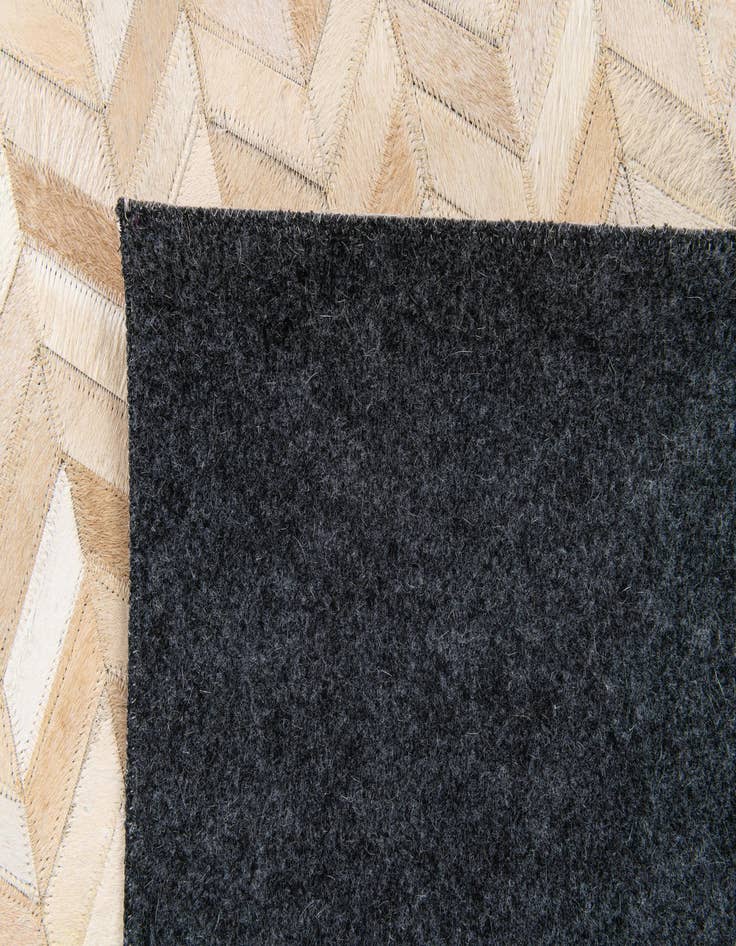 Detail image of  5' 1 x 7' 11 Cowhide Stocks Rug