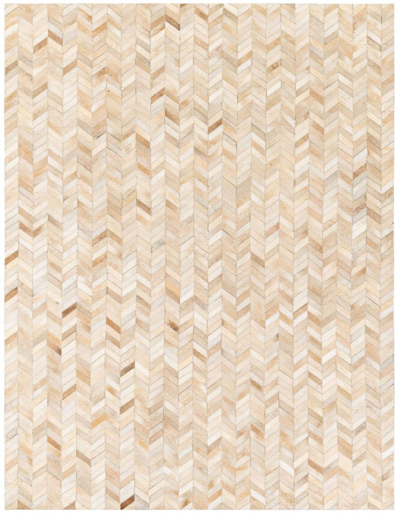 A 5x8 rectangular Cowhide Stocks rug from Rugs.com featuring a modern chevron pattern in varied shades of brown, tan, and ivory.