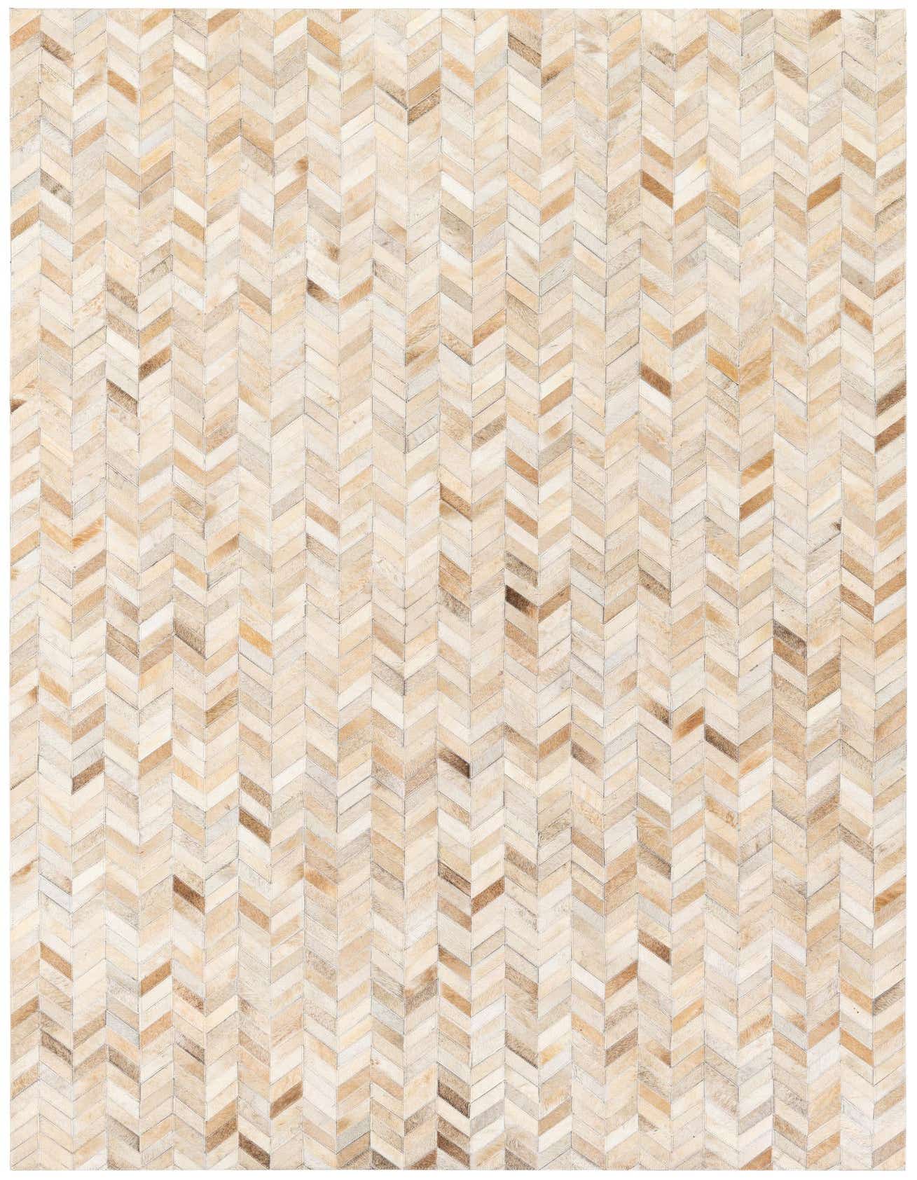 A 5x8 rectangular Cowhide Stocks rug by Rugs.com, featuring a modern chevron pattern in shades of brown, tan, and ivory.