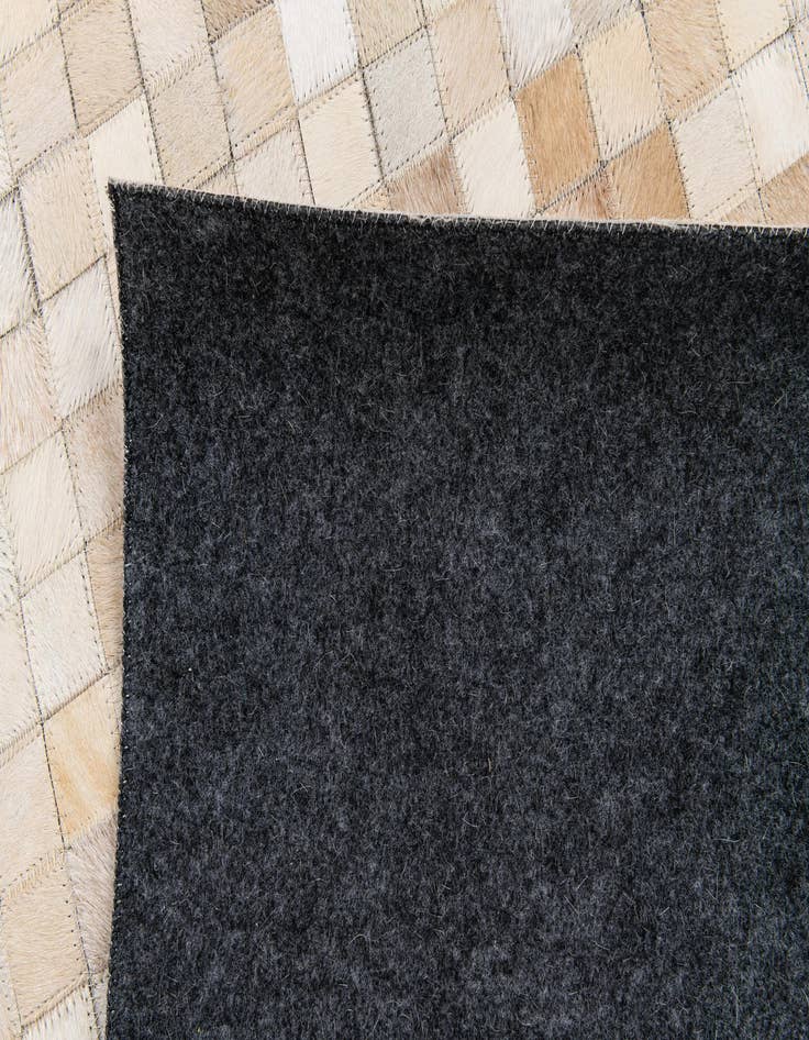 Detail image of  5' 1 x 7' 11 Cowhide Stocks Rug