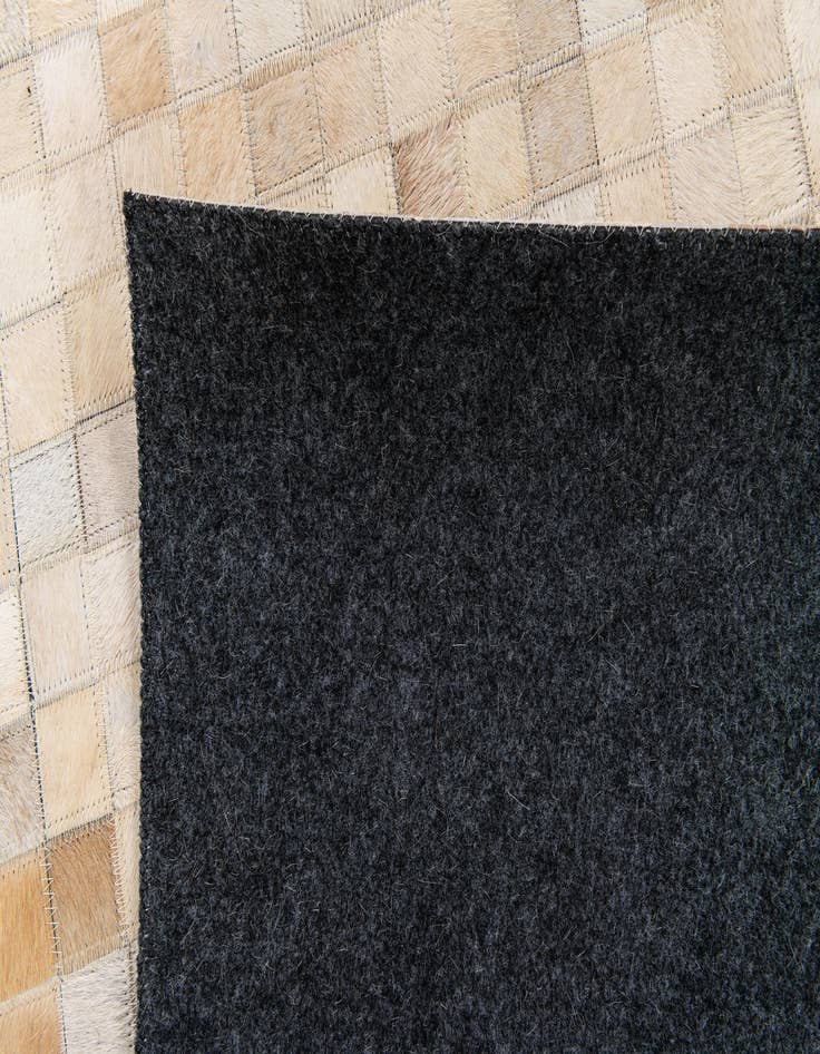 Detail image of  5' 2 x 7' 11 Cowhide Stocks Rug