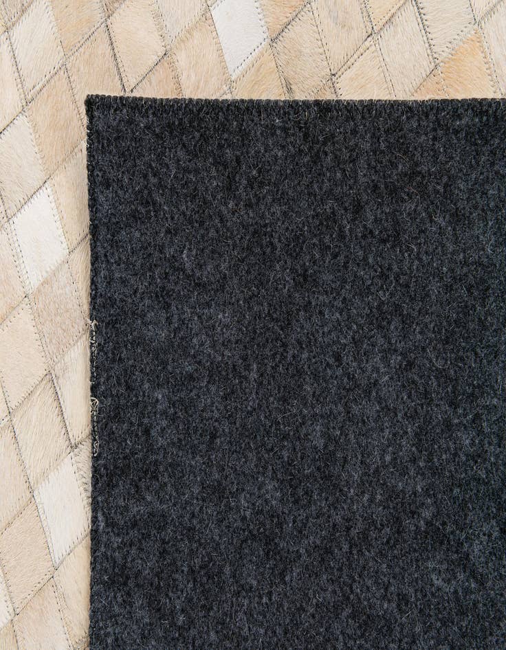 Detail image of  5' 2 x 7' 11 Cowhide Stocks Rug