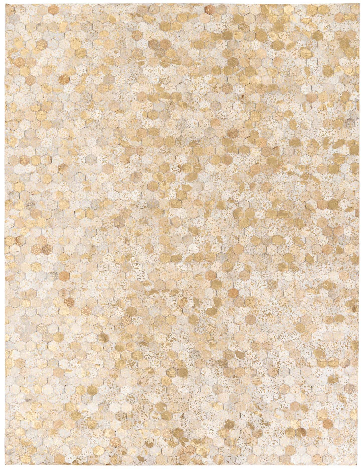 A rectangular 5x8 modern Cowhide Stocks rug featuring a mosaic of brown, tan, and ivory hexagonal cowhide patches.