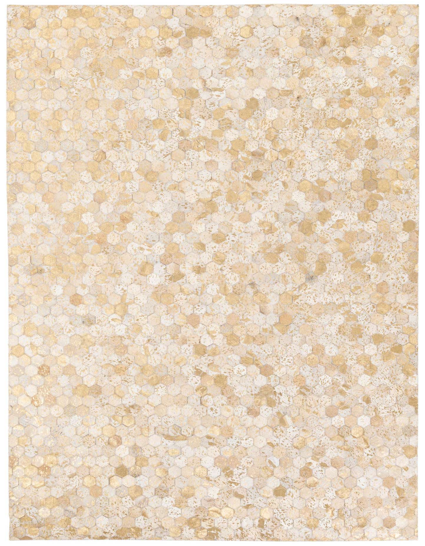 A 5x7 rectangular modern cowhide rug featuring a mosaic of brown, tan, and cream hexagonal patches.