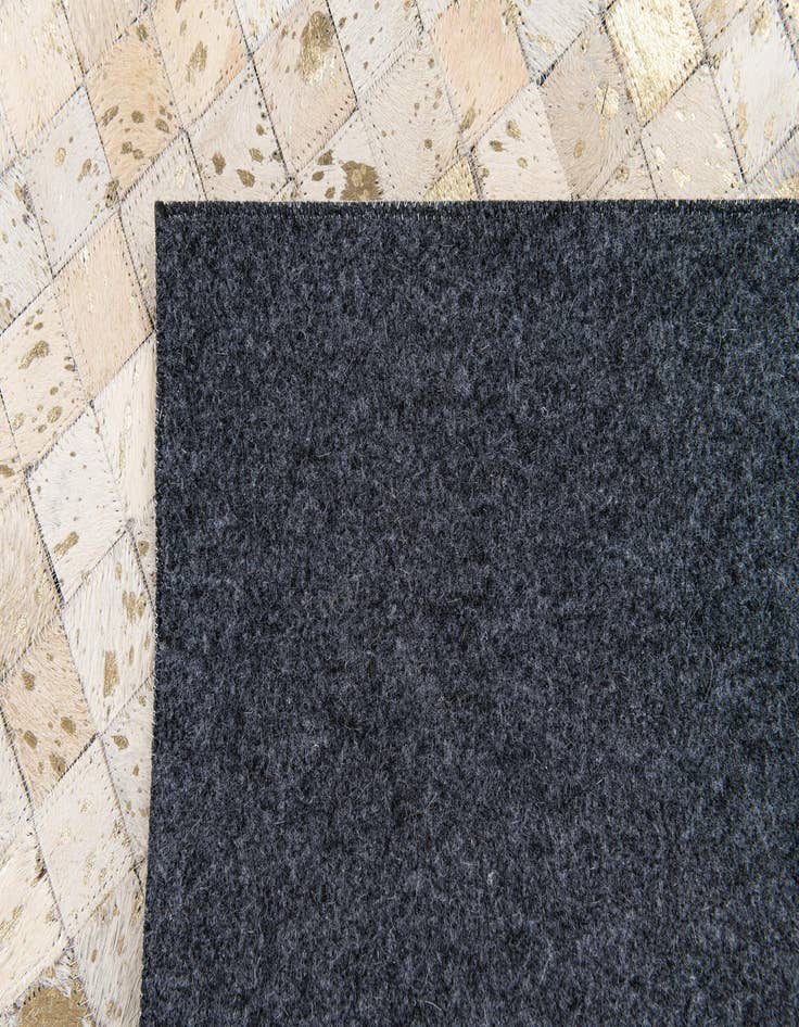 Detail image of  5' 2 x 7' 5 Cowhide Stocks Rug