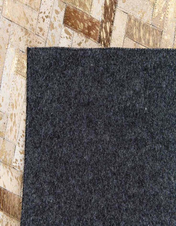 Detail image of  5' 3 x 7' 7 Cowhide Stocks Rug