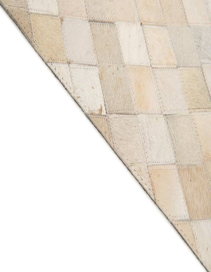 Detail image of  6' x 8' 11 Cowhide Stocks Rug