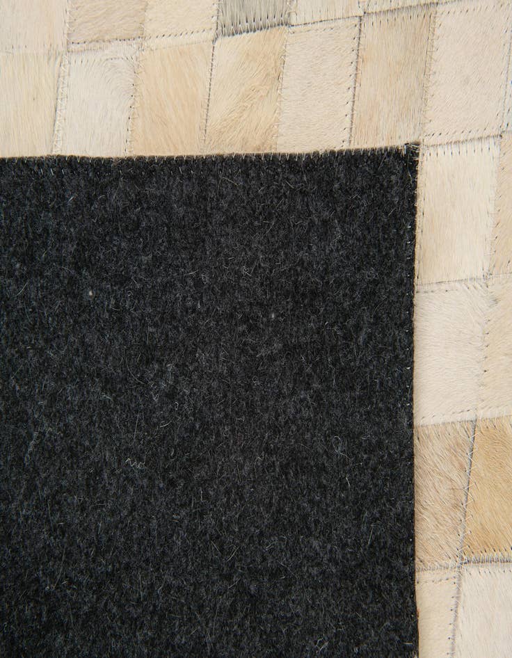 Detail image of  6' x 8' 11 Cowhide Stocks Rug