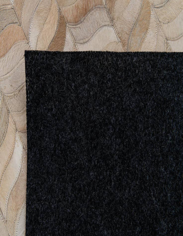 Detail image of  6' 8 x 9' 8 Cowhide Stocks Rug