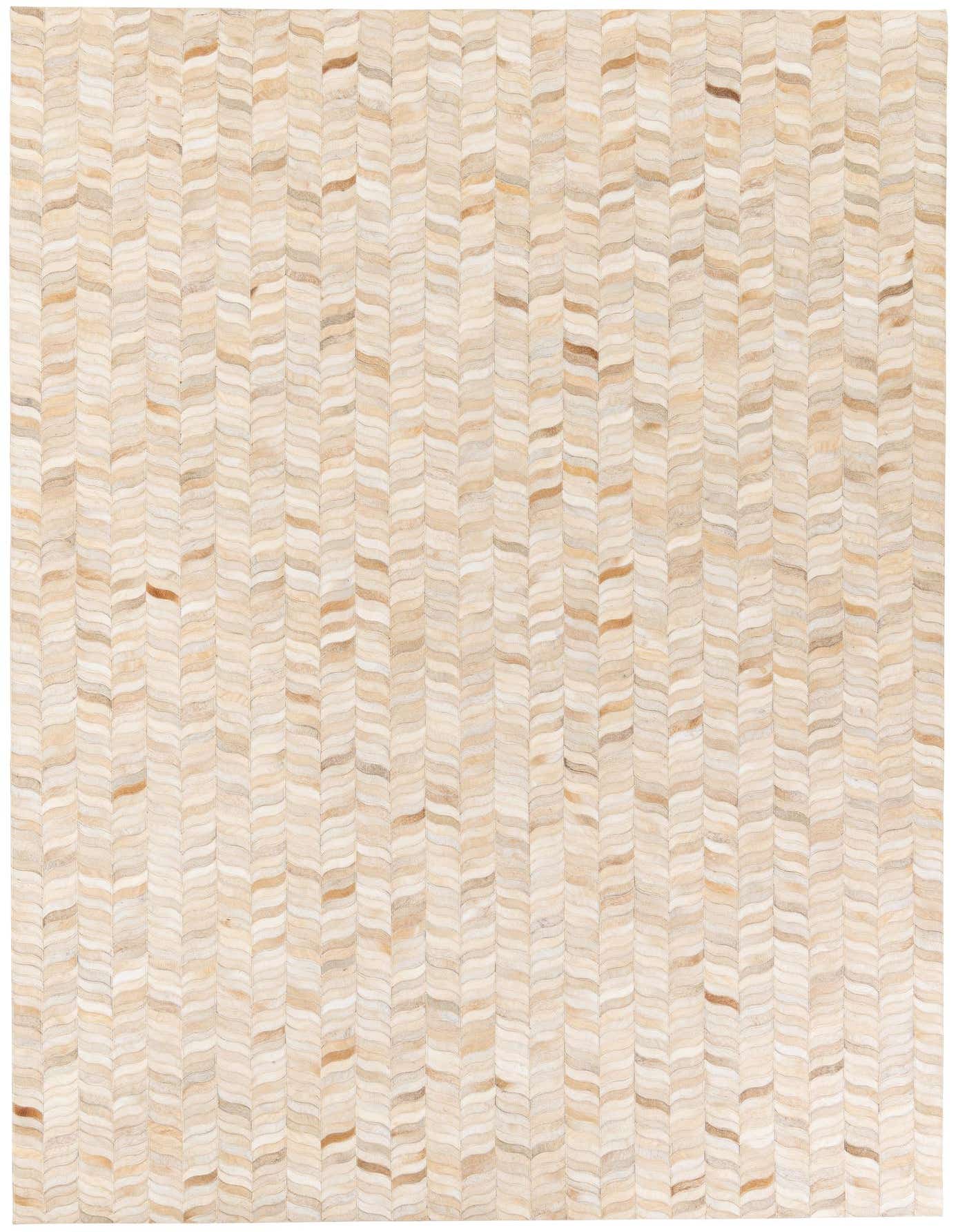 A 7x10 rectangular Cowhide Stocks rug featuring a modern chevron pattern in shades of brown, tan, and ivory.