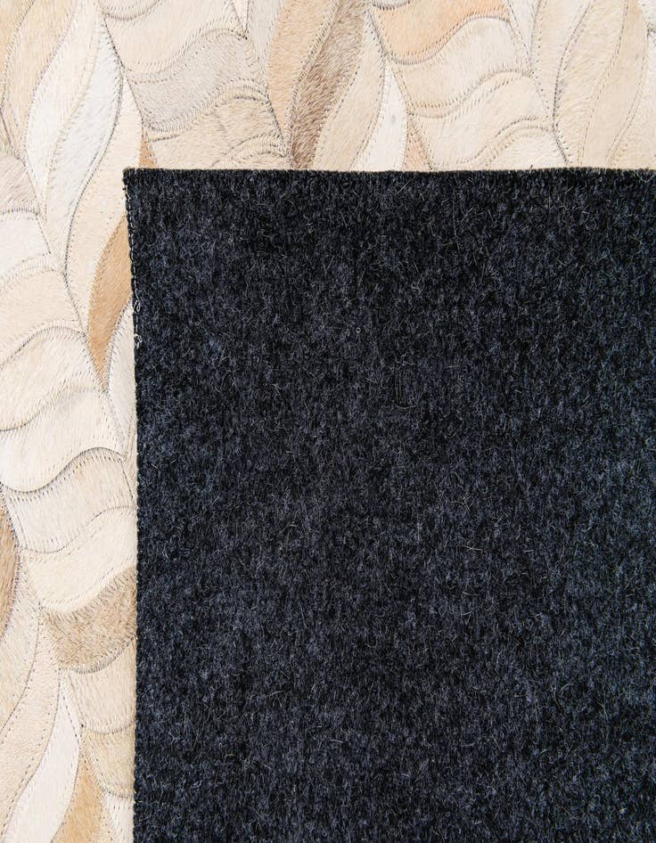 Detail image of  6' 8 x 9' 9 Cowhide Stocks Rug