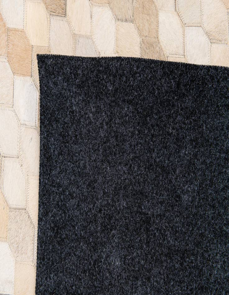 Detail image of  6' 8 x 10' Cowhide Stocks Rug