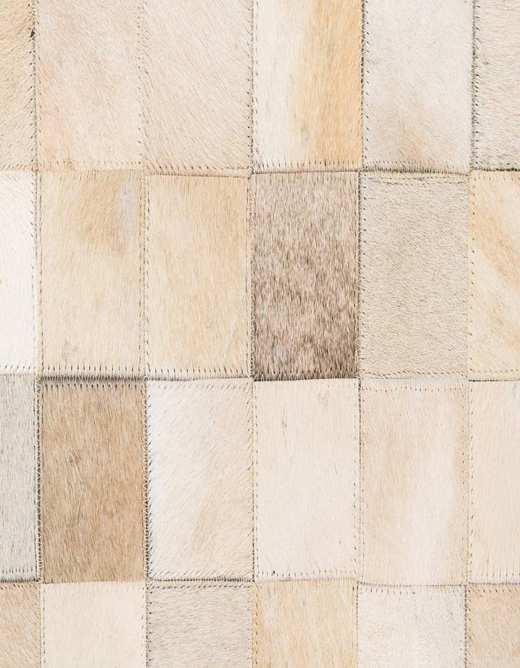 Detail image of  6' 8 x 9' 11 Cowhide Stocks Rug