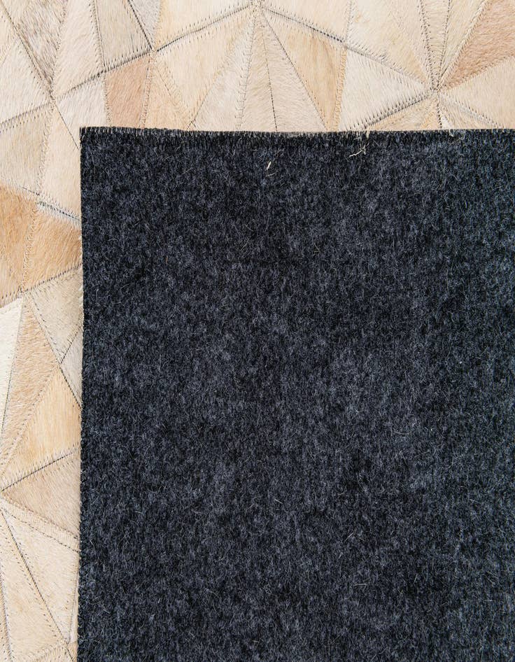 Detail image of  6' 9 x 9' 8 Cowhide Stocks Rug