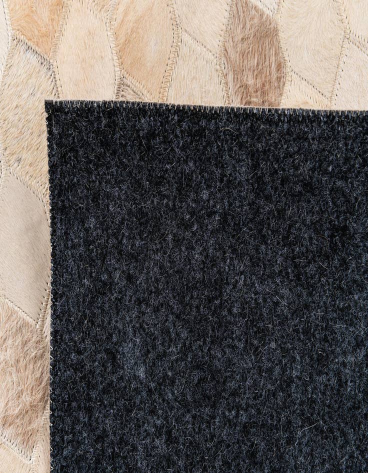 Detail image of  4' 8 x 6' 7 Cowhide Stocks Rug