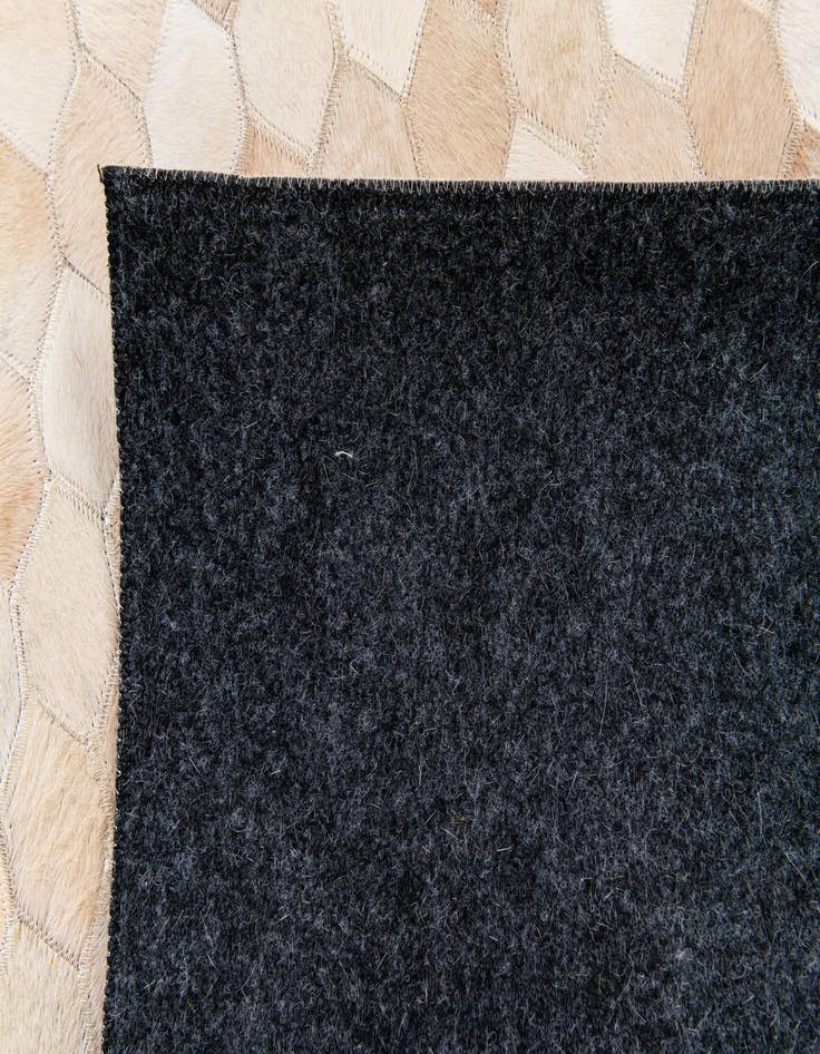 Detail image of  4' 8 x 6' 7 Cowhide Stocks Rug