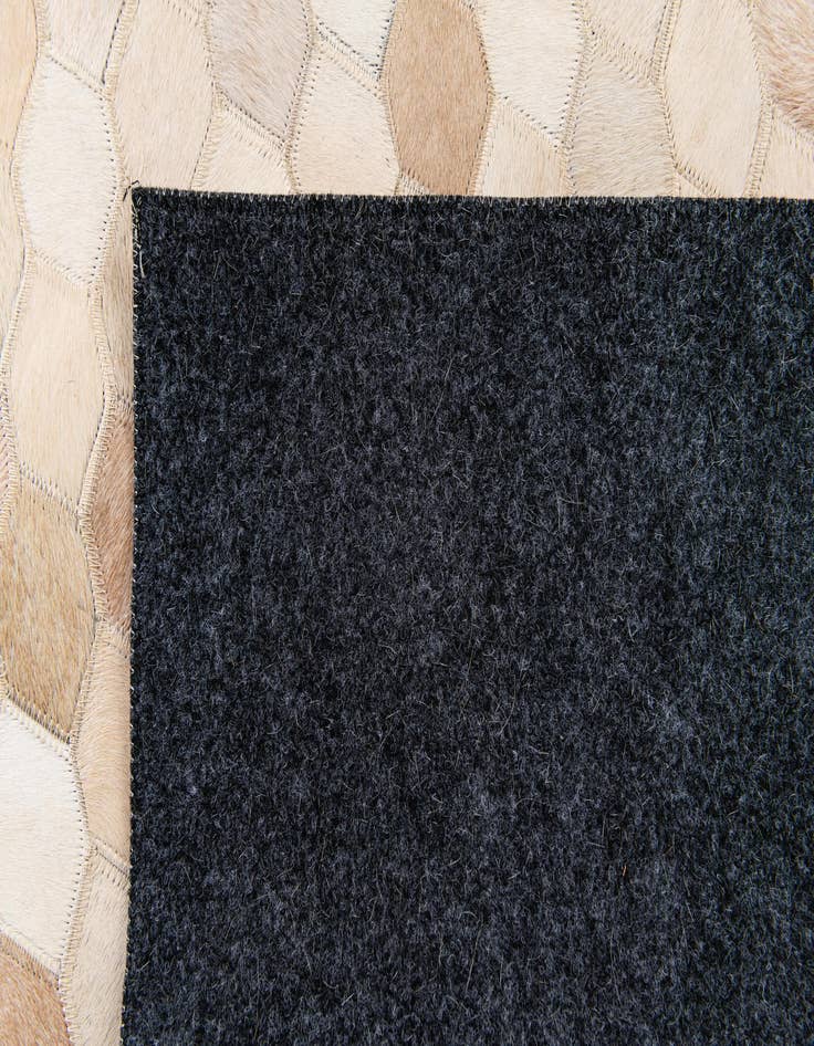 Detail image of  4' 6 x 6' 7 Cowhide Stocks Rug